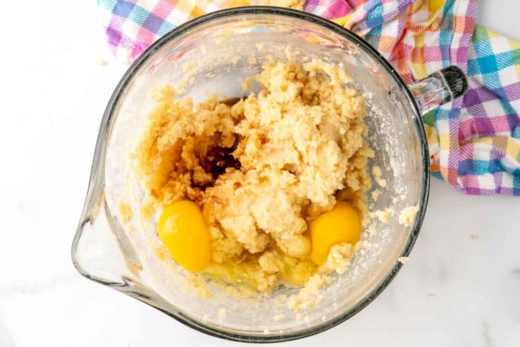 eggs and vanilla added to creamed butter and sugar.