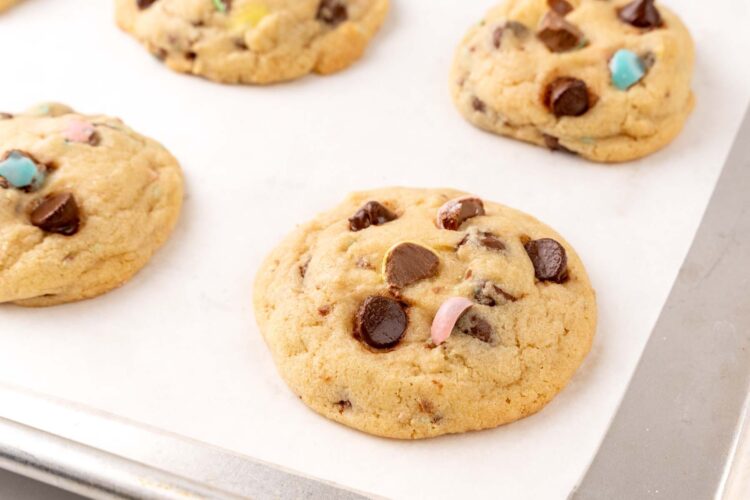 baked cadbury egg cookies on a sheet pan.