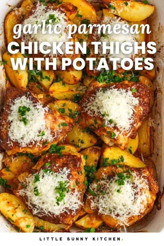 Overhead view of baked chicken thighs in a pan with roasted potatoes, topped with cheese and parsley. Text overlay says "garlic parmesan chicken thighs with potatoes"