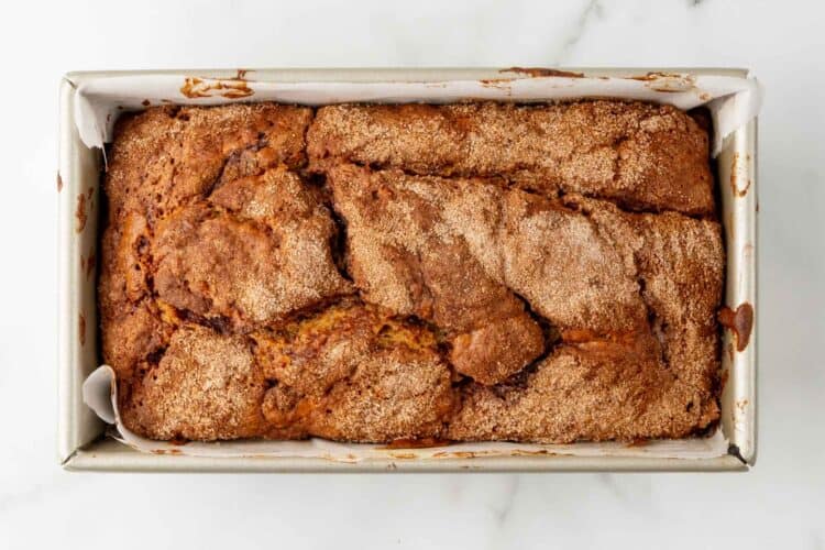 baked cinnamon swirl banana bread, still in the pan.