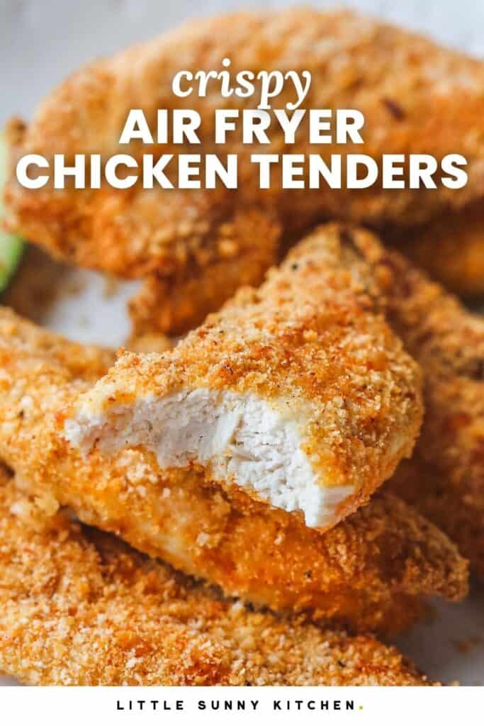 Crispy air fryer chicken tenders with a bite taken out.