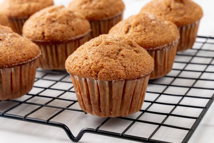 applesauce muffins cooling on a wire rack.