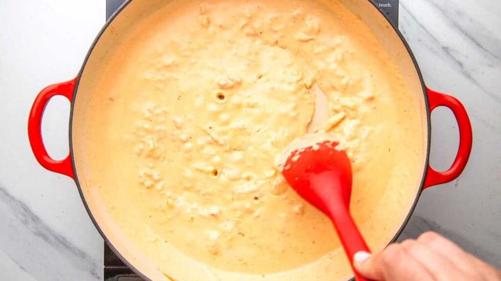 creamy cajun sauce, simmering.