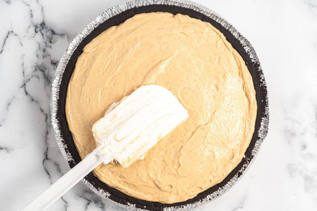 fluffy peanut butter pie filling added to a store-bought chocolate crust.