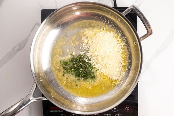 butter, breadcrumbs, and chopped sage in a frying pan.