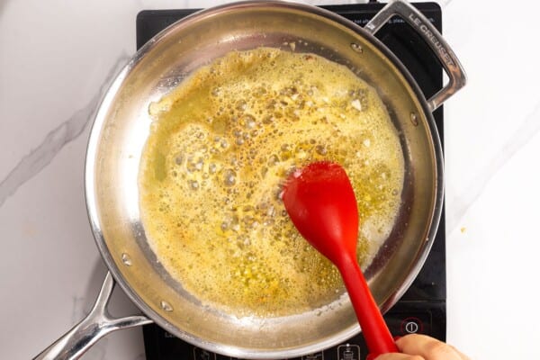 melted butter in a skillet, stirred with a spoon as it browns.