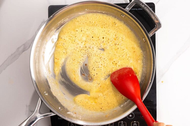flour and butter cooking in a skillet to make the base of a sauce.