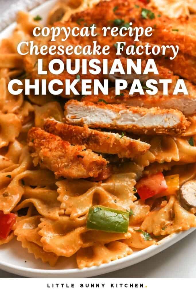 a plate of bowtie pasta and crispy chicken cutlets in a creamy cajun sauce. Text overlay says "copycat recipe cheesecake factory Louisiana chicken pasta"