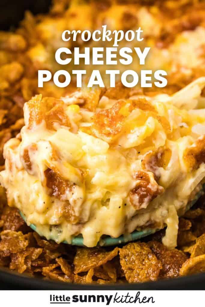A spoonful of creamy hash brown potatoes with cornflake topping. Text overlay says "crockpot cheesy potatoes"