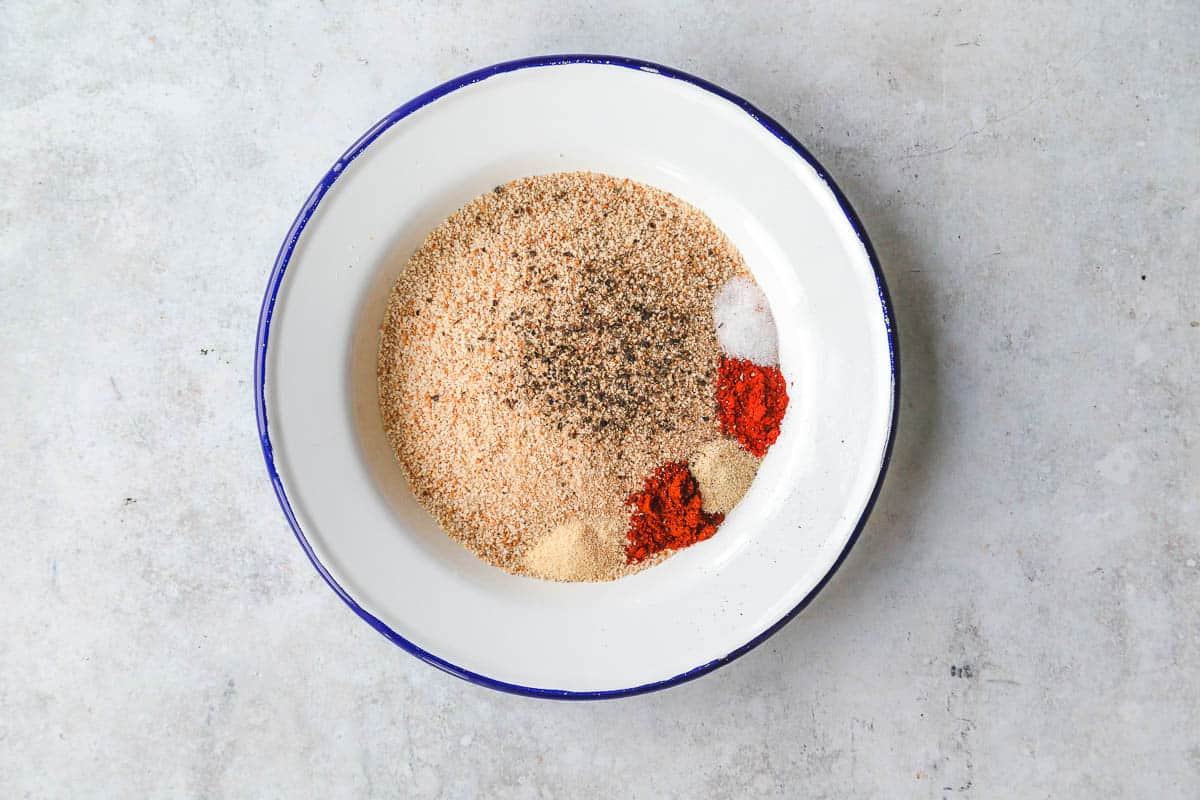 dried breadcrumbs and seasonings in a white plate