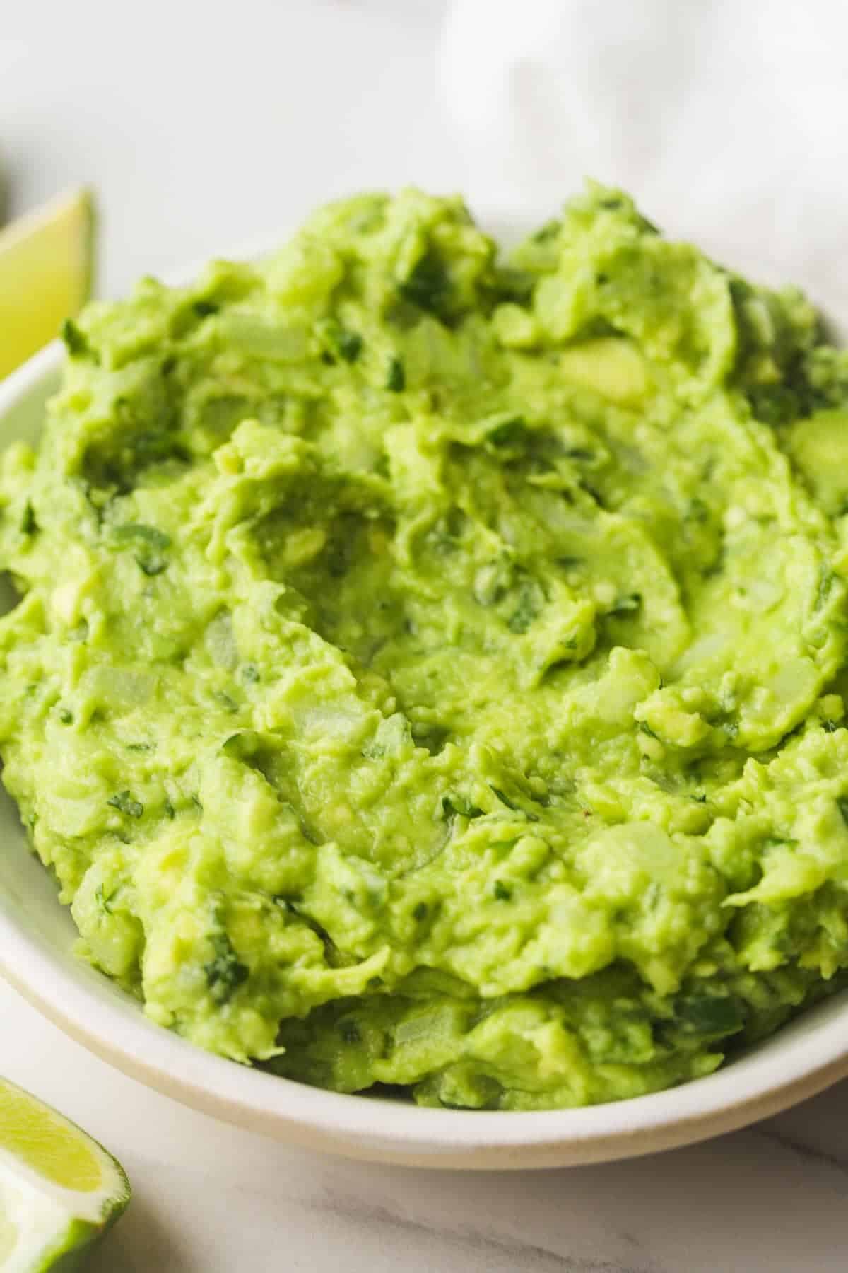 A close up shot of creamy guacamole