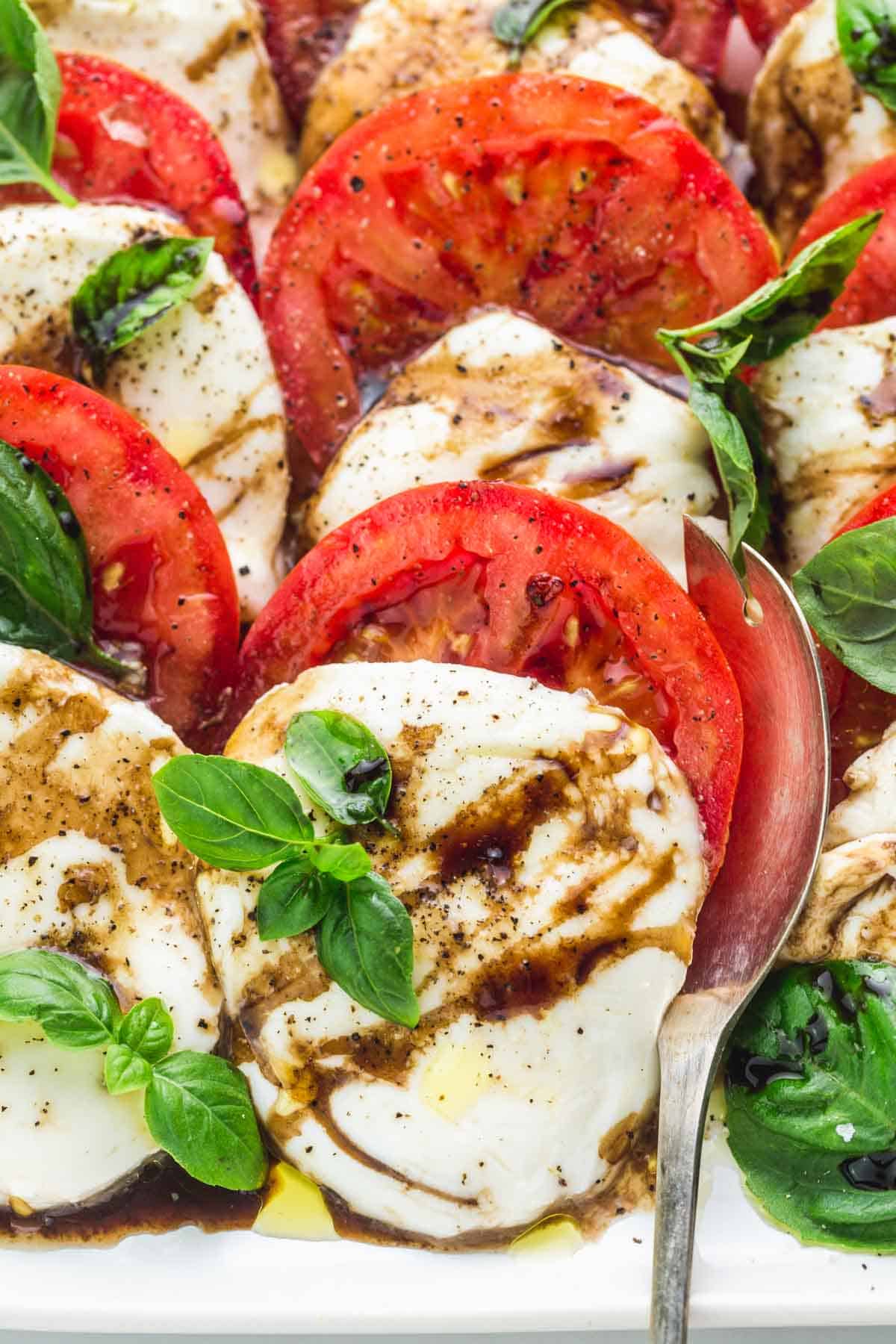 Close up of caprese salad being served