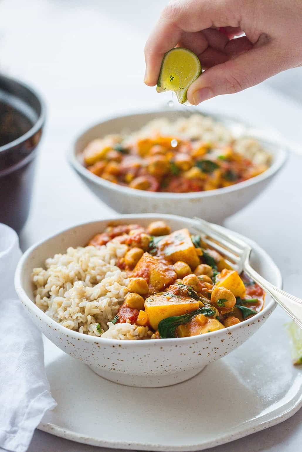 Squeezing lime juice over the curry