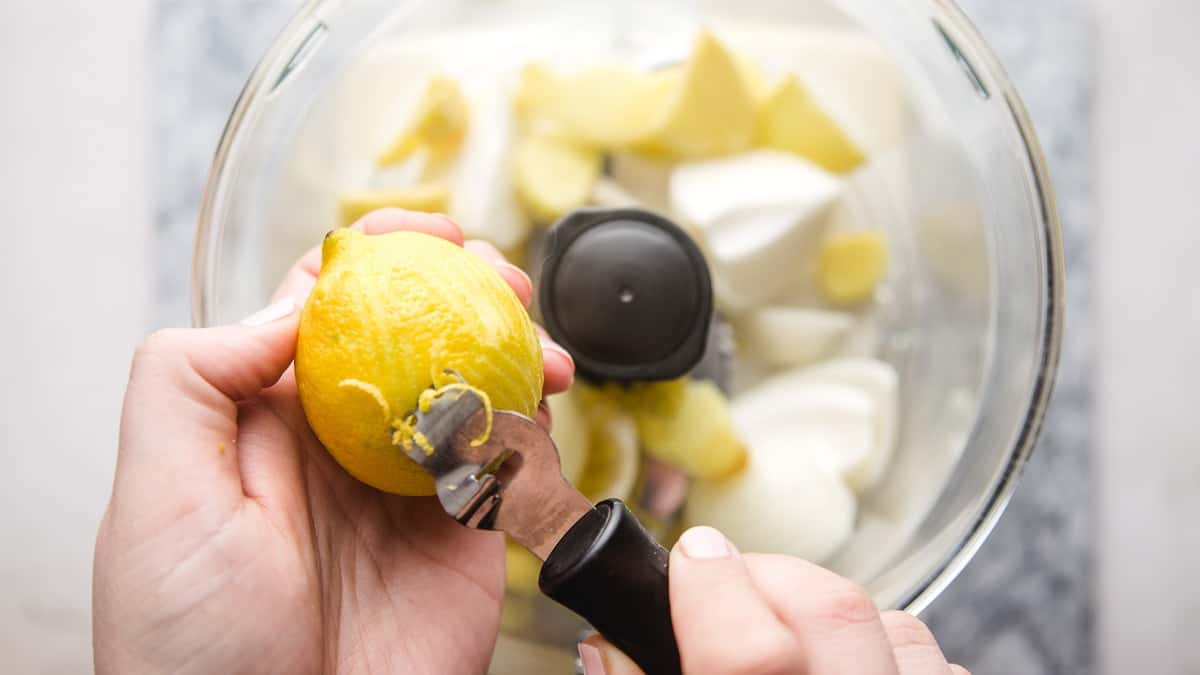 Zesting a lemon with a OXO zester