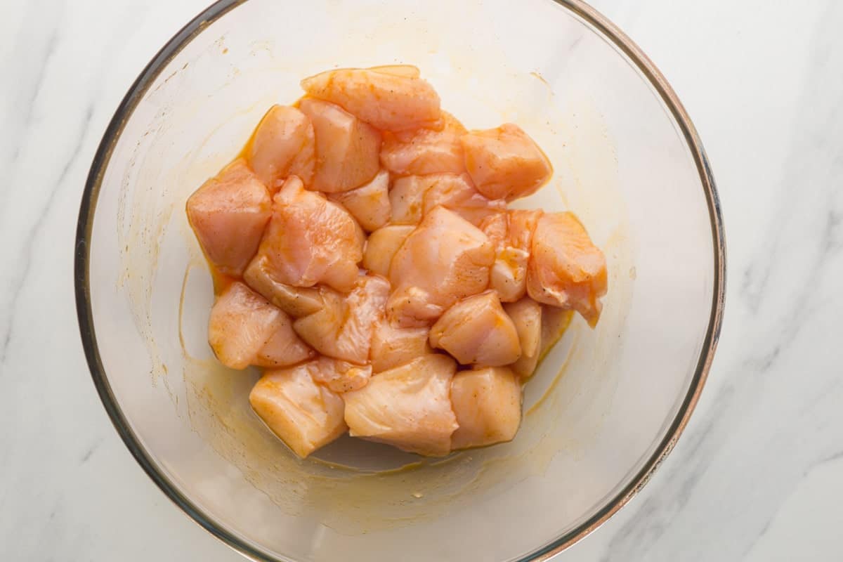 Marinating chicken in a glass bowl