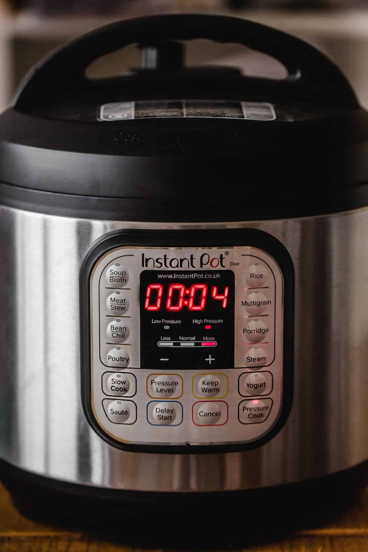 Close up shot of the instant pot working with the pressure cook setting