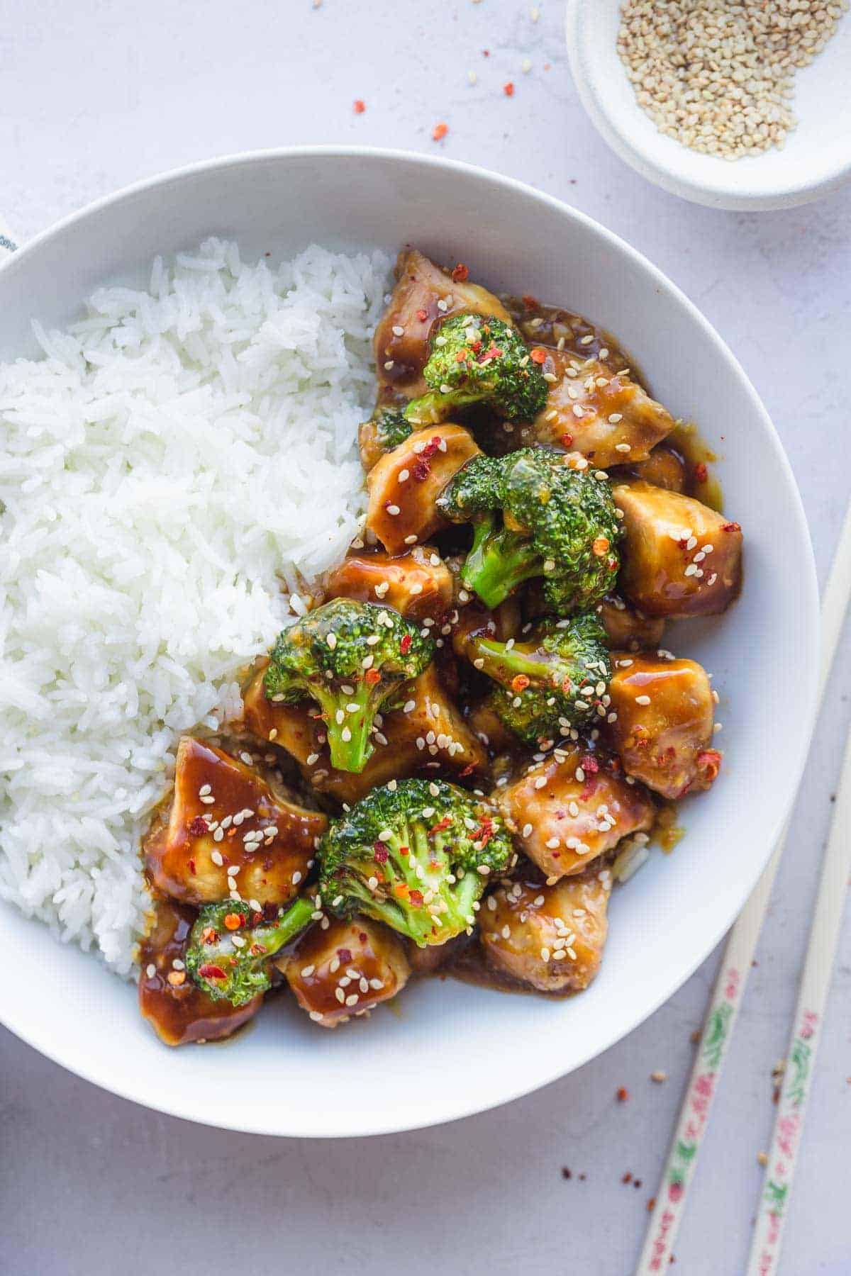 Instant Pot Chinese Chicken and broccoli with basmati rice in a white bowl