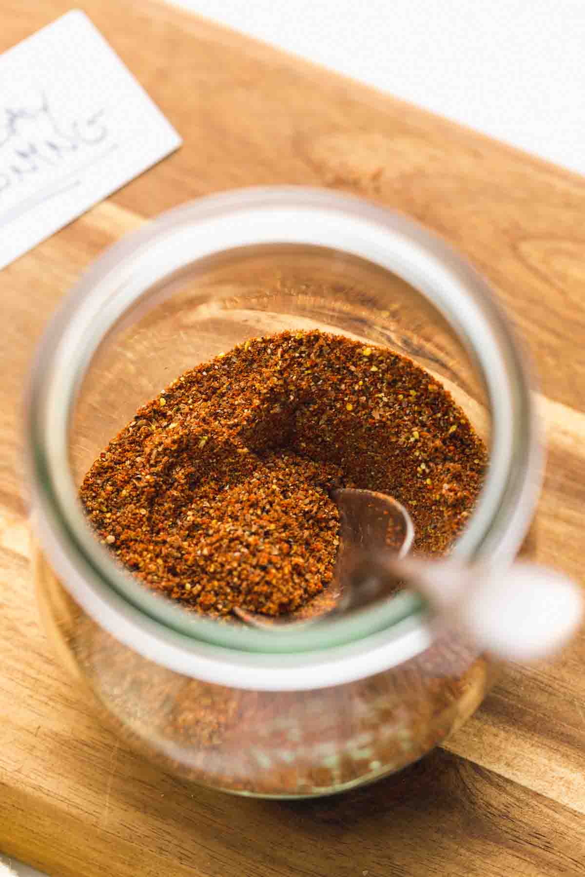Old bay seasoning blend in a small glass jar